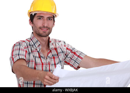A foreman checking the plans. Stock Photo