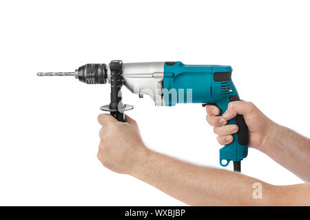 Electric drill in hands Stock Photo