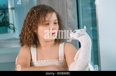 small girls with hand puppets Stock Photo