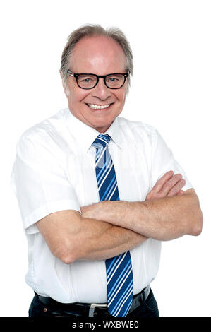 Confident senior manager of a company. Facing camera with a smile. Stock Photo