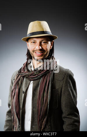 Man wearing vintage hat in funny concept Stock Photo