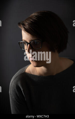 young woman with glasses portrait Stock Photo