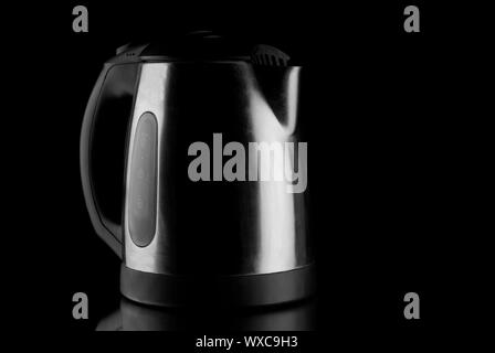 Electric Kettle with reflection on mirror Stock Photo