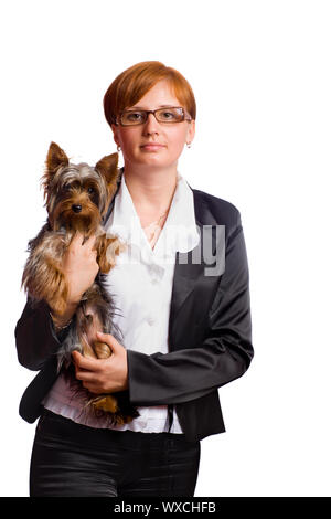 Business woman holding yorkshire terrier isolated on white Stock Photo