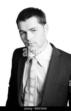 Portrait of Young man wearing suit with tie Stock Photo