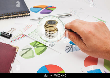 Graphs tables and documents laid on the table Stock Photo