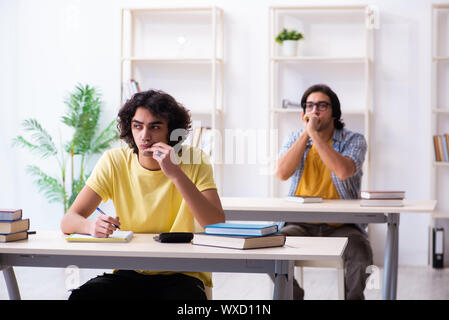 Two male students in the classroom Stock Photo