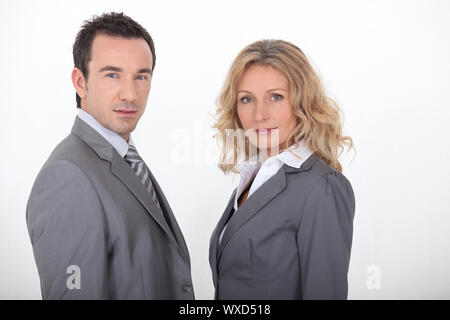 Couple in gray suit on white background Stock Photo