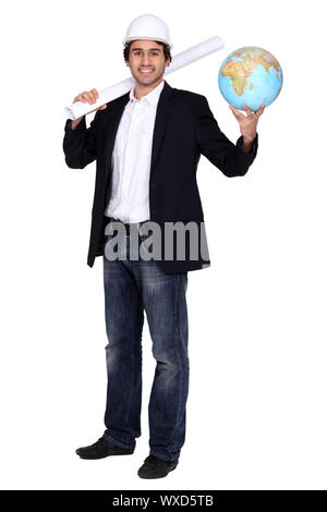 Architect holding globe Stock Photo