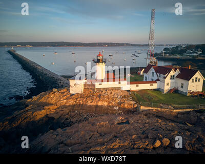 Lighthouse at sunrise in Gloucester, Massachusetts Stock Photo