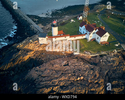 Lighthouse at sunrise in Gloucester, Massachusetts Stock Photo