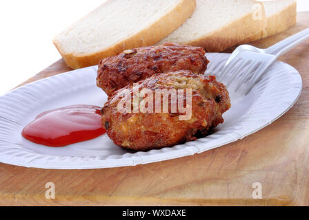 Disposable plates and forks with bread and ketchup Stock Photo - Alamy