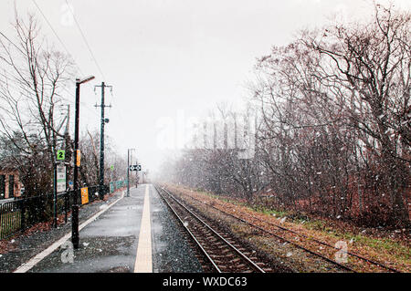 DEC 1, 2018 Hakodate, JAPAN - JR Onuma Koen station empty platform during snow fall in winter foggy atmosphere and beautiful nature scene Stock Photo