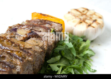 shashlik with potherbs on the plate Stock Photo
