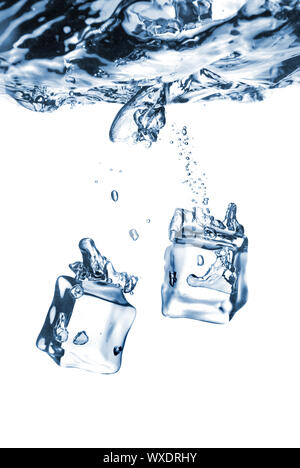 ice cubes dropped into water with bubbles isolated on white Stock Photo ...