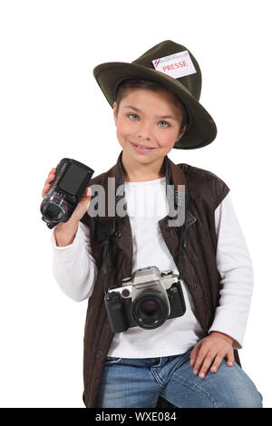 Little girl dressed as a reporter Stock Photo