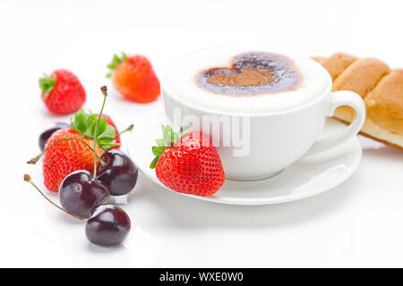 cappuccino in a cup in the shape of hearts,cherry,croissant  and strawberries isolated on white Stock Photo