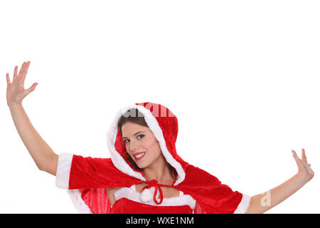 Young woman dressed in a cute Christmas outfit Stock Photo