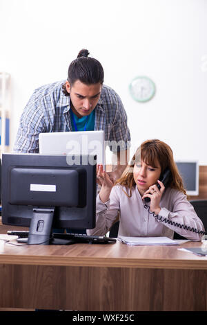 Young male it specialist in the office Stock Photo