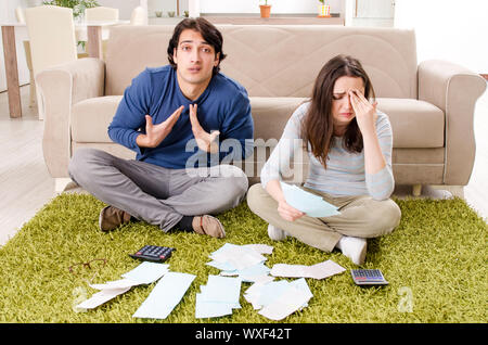 Young couple in budget planning concept Stock Photo