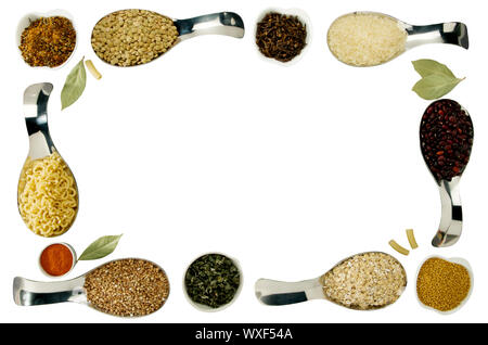 BEANS RICE BUCKWHEAT SEEDS LENTILS SPICES IN SPOONS ON THE ISOLATE Stock Photo