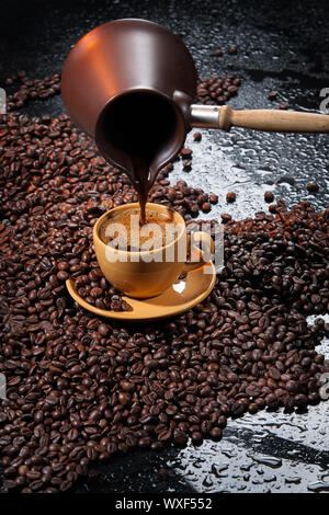 Heating up espresso coffee in a Cuban coffee maker using a mini gas stove  with a Coleman propane tank on a single burner. A thunderstorm is  approaching Stock Photo - Alamy