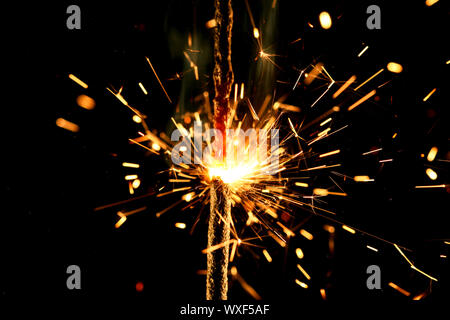 christmas sparkler firework flame on black