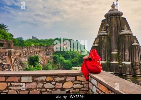 Chittorgarh, Udaipur, Rajasthan, India - August 25 2019: Rajasthani women with Traditional dress sitting near temple in Chittorgarh Fort Stock Photo