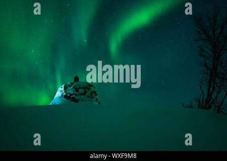 Aurora borealis above the Norway Finland border Stock Photo