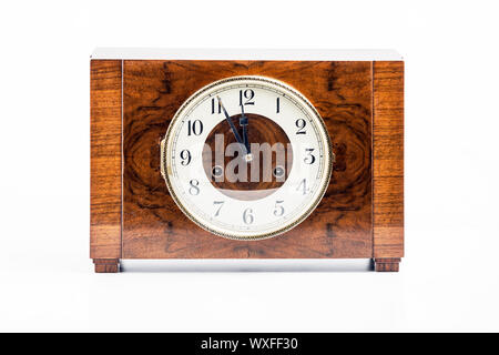 Picture of a historic wood clock on white background Stock Photo