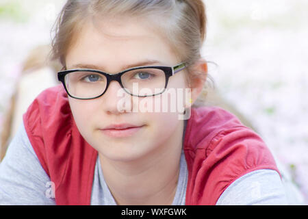 portrait of young girl with glasses Stock Photo