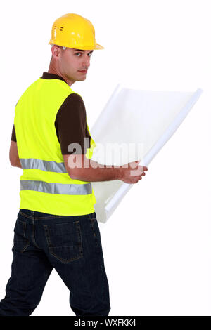 craftsman holding a blueprint Stock Photo - Alamy