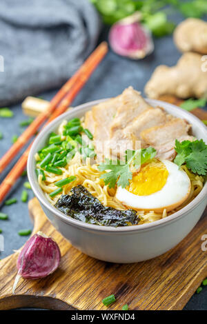 Ramen noodles with pork and pickled egg. Stock Photo