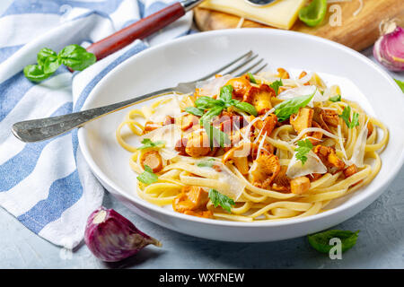 Linguine with fried wild chanterelles. Stock Photo