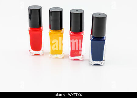 Nail polish arrangement of 4 bottles in different shades Stock Photo