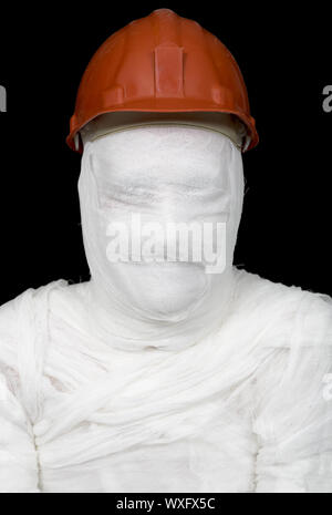 Bandaged worker in helmet on black background Stock Photo