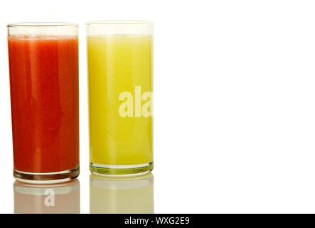 Fresh cocktail on isolate. Two glasses with vegetable cocktails. Healthy drinks. Stock Photo
