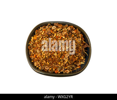 A mixture of seasonings in a bowl isolated on a white background. Spice on isolate. View from above. Stock Photo