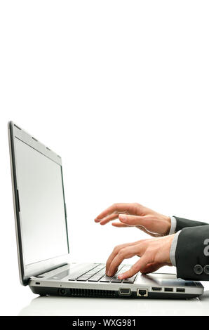 Detail of student hands working on laptop. Stock Photo
