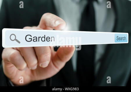 Word Garden written in search bar on virtual screen. Stock Photo