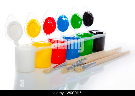 Water based paints and brush, isolated on a white background Stock Photo