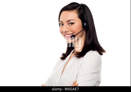 Young confident call centre executive at your assistance Stock Photo