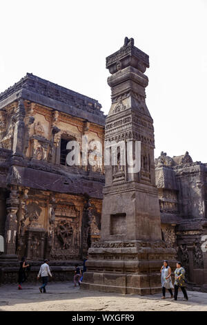 Ellora, Maharashtra, INDIA - JANUARY 15, 2018: Kailash Temple in Ellora. Visitors walk inside the temple courtyard Stock Photo