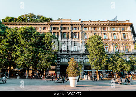 MILAN, ITALY - MAY 30, 2019: People Walking In Busy Downtown City Center Of Milan Stock Photo