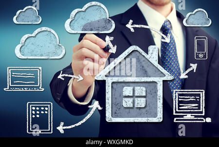 Cloud Computing at Home Concept over Blue Background Stock Photo