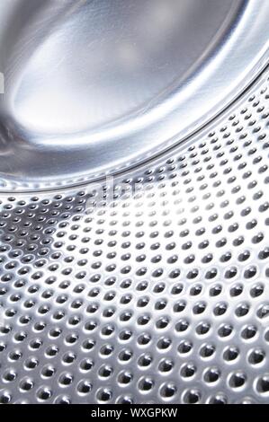 washing machine drum background with copyspace showing household concept Stock Photo