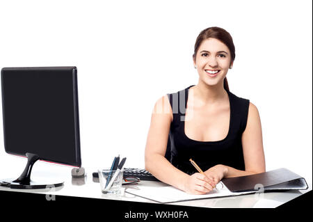 Smiling business lady busy in her work Stock Photo