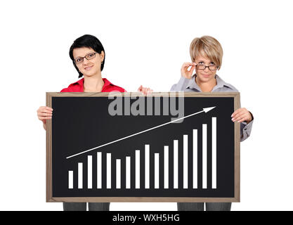 two businesswoman holding a blackboard with chart Stock Photo