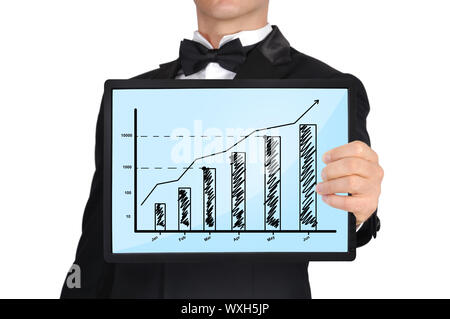 businessman in tuxedo holding tablet with business chart Stock Photo