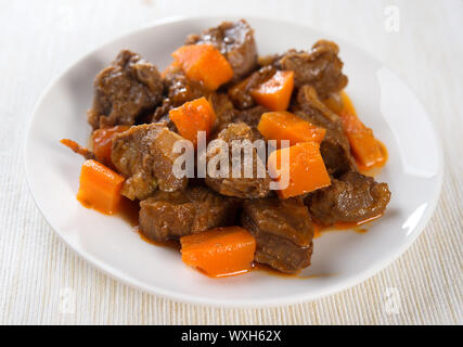 Arab dish, mutton and carrot in a plate ready to eat, Middle eastern food. Stock Photo